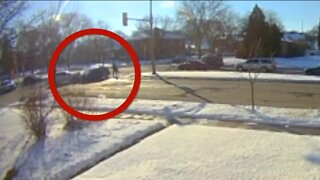 Impact of car crash hurls pedestrian into light pole