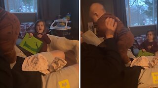 Jealous sister devastated when dad plays with baby brother