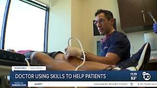 Doctor using martial arts skills to help patients
