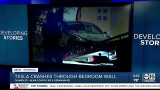 Tesla crashes through Chandler bedroom wall