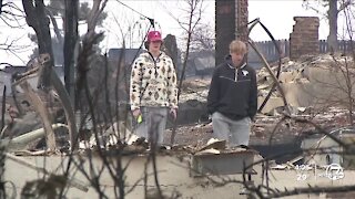 Neighbors in Louisville's Enclave neighborhood return to survey damage