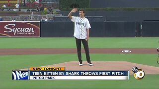 Teen bitten by shark throws first pitch at Padres game