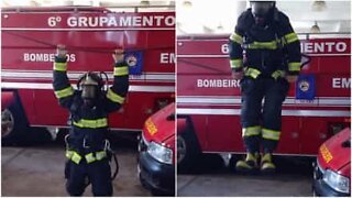 Firefighter works out in full gear