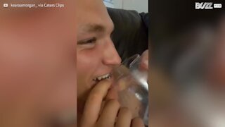 Man traps lip in broken wine glass