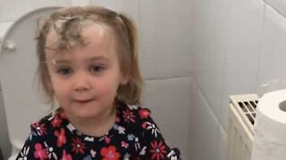 Girl caught washing hair with toilet paper