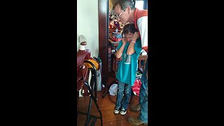 Little girl cries tears of happiness over Christmas gift