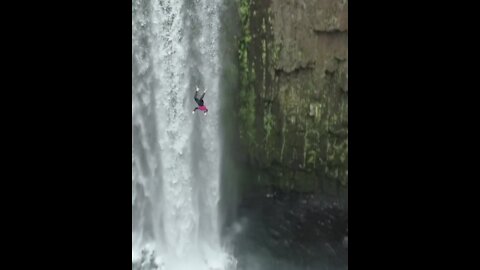 This is by far the most epic waterfall dive you will ever see