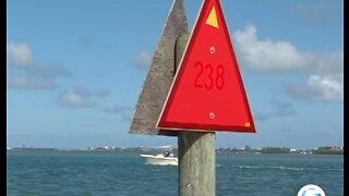 Channel marker shows scars from deadly boat crash