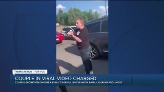 Couple in viral video charged