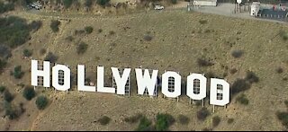 6 arrested after defacing Hollywood sign to bring awareness to breast cancer