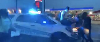 National: Video shows officer driving into protestors in Detroit