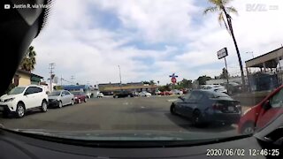 Distracted employee collides with boss's car