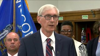 Gov. Evers signs massive tax cut, announces over $100 million in funding for public schools