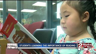 Students learning the importance of reading