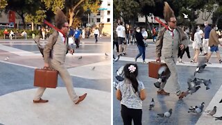 Street performer's "frozen in time" stance will totally blow your mind