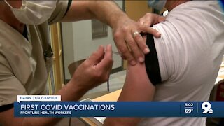 COVID vaccinations begin for health workers