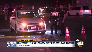 Woman killed by motorcycle while crossing street
