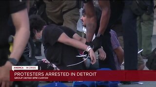 Police arrest dozens of protesters in Detroit for defying city's 8 p.m. curfew