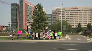 Colorado health care workers protest vaccine mandates as a condition of employment
