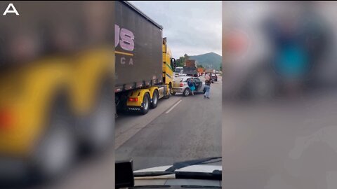 Truck Ploughs Car Down Highway