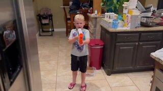 Brave boy pulls out first loose tooth with Nerf gun