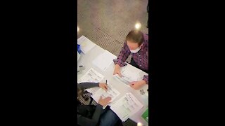 Lady Fills Out Several Ballots. Caught on Camera.