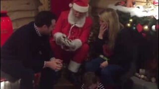 Santa Claus helps out with a marriage proposal
