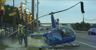 Surveillance video shows helicopter crash in Tampa