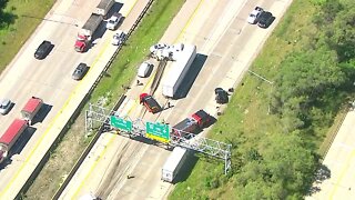2 dead after crash involving a semi and multiple vehicles