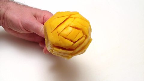 Learn how to make a mango rose in one minute