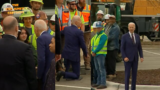 Biden goes straight to a young woman in a group of workers, talks leaning his face in closer to her, gets lost walking to the wrong direction.