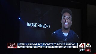 Family, friends lay 'superhero' shooting victim Dwane Simmons to rest