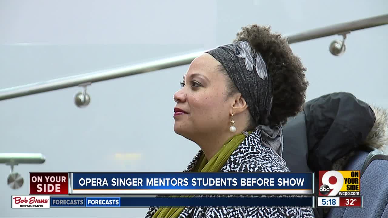 Opera singer mentors students before show