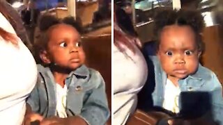 Baby girl hilariously shocked during amusement park ride