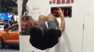 Man stops clock with insane backflip