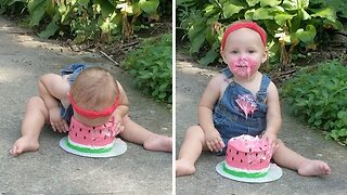 CHEEKY ONE-YEAR-OLD BURIES FACE FULLY INTO CAKE AT FAMILY PHOTOSHOOT