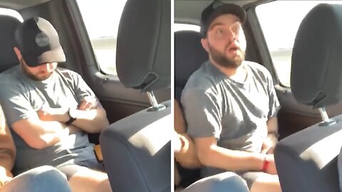 Guy sleeping in car falls victim to trending viral prank