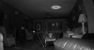 Security camera captures mysterious light in living room