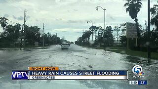 Heavy rain causes street flooding in Greenacres