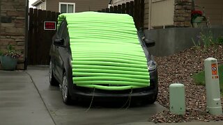 Family uses pool noodles to protect car from hail