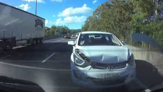 Distracted driver crashes into car