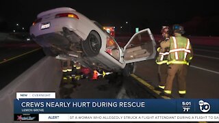 Crews nearly hurt during rescue