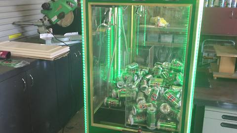 Man turns claw machine into beer can skill tester