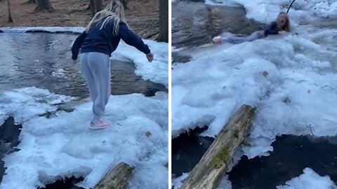 Epic fail: Woman slips and falls into frozen water