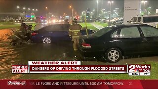 dangers of driving through flooded streets
