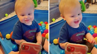 Baby Cracks Up While Watching Video Of Himself