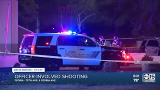 Man shot after alleged ramming Peoria police vehicle