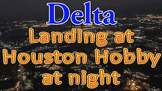 Delta flight landing at Houston Hobby at night