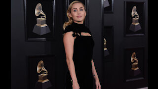 Miley Cyrus' Christmas Day features 'apology texts and conspiracy theories'