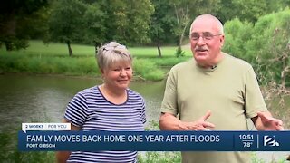 Family moves back home one year after floods